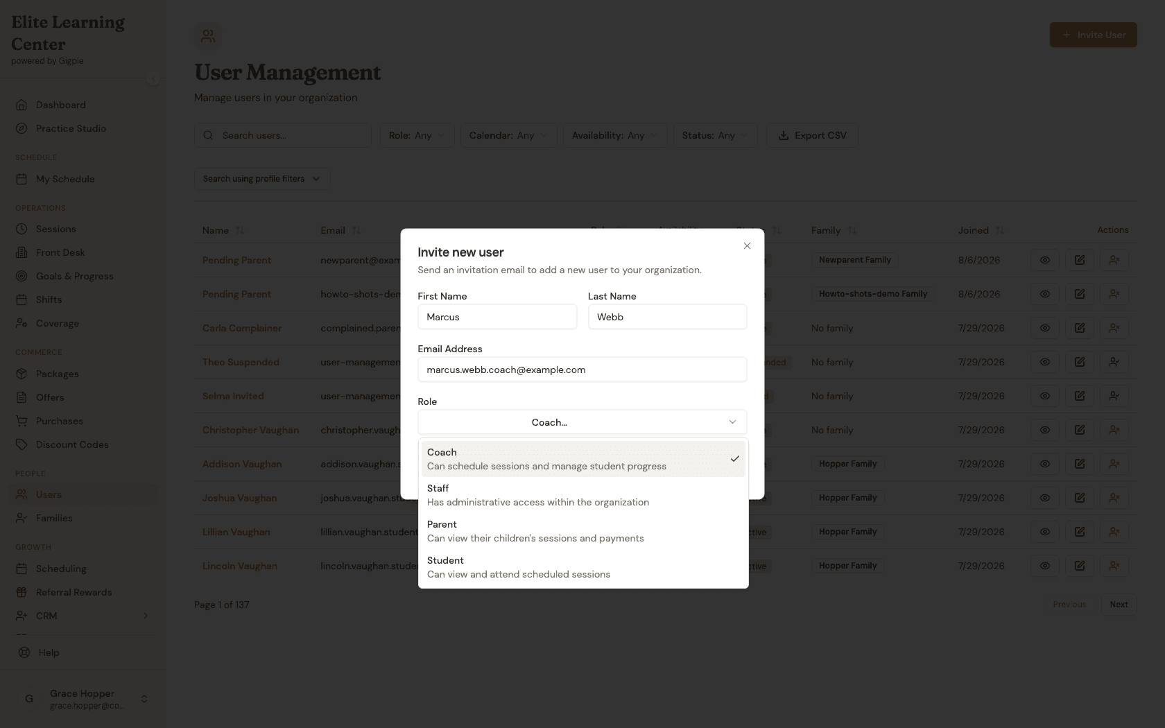 Role dropdown open showing Coach, Staff, Parent, and Student options with their access descriptions